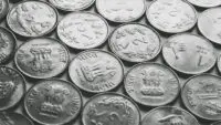 Rupee Weakens on Dollar Demand